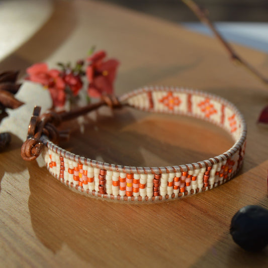 Leather wrap seed beads bracelet.