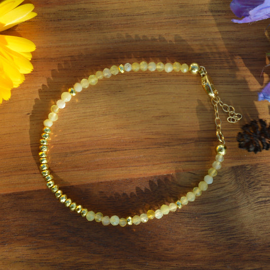 Yellow Opal & Gold Hematite gemstone bracelet.